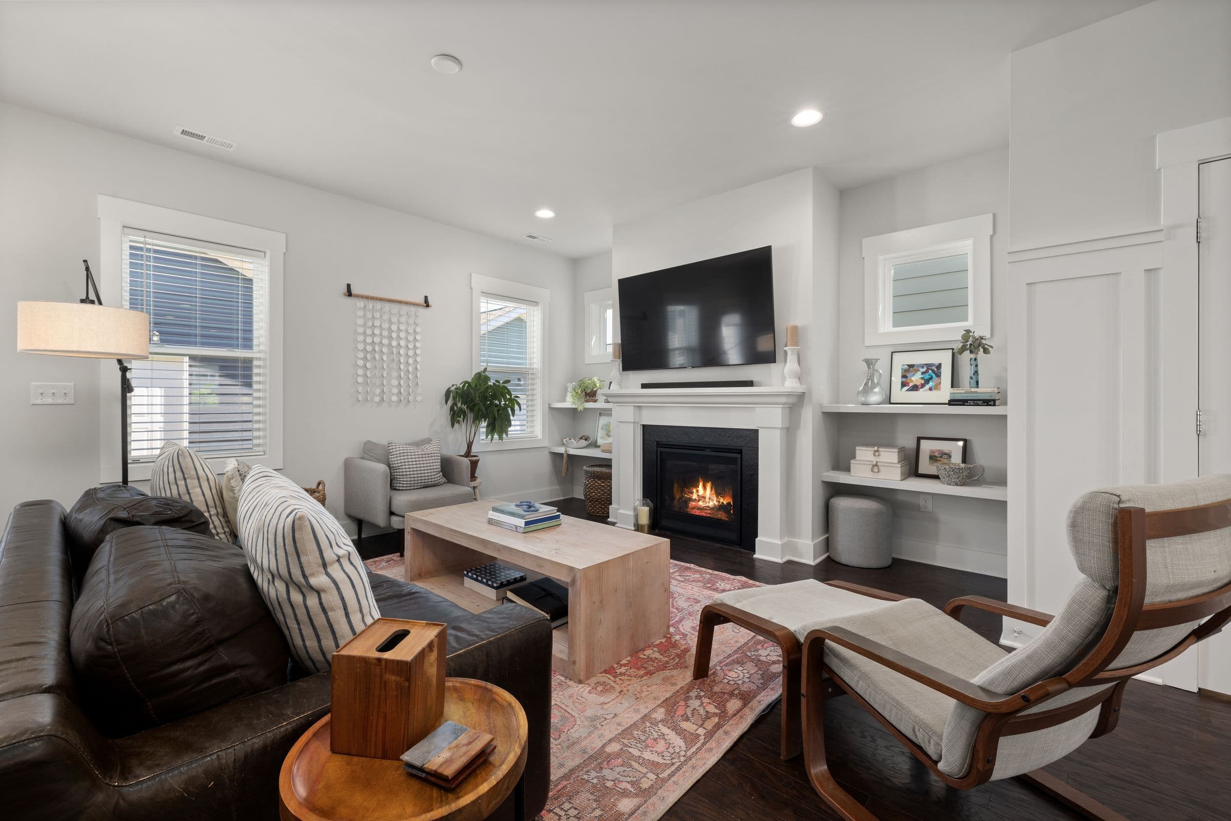 A warm, lived-in living room with a fireplace
